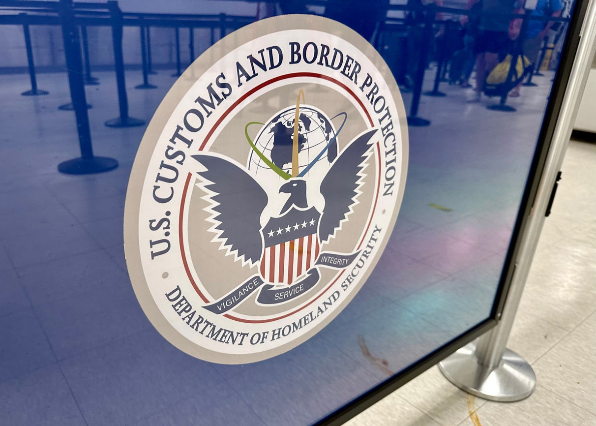 Expedited removal U.S. Customs and Border Patrol sign on building